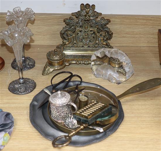 A brass desk stand, a chamberstick, a pewter dish, a paperweight and sundries